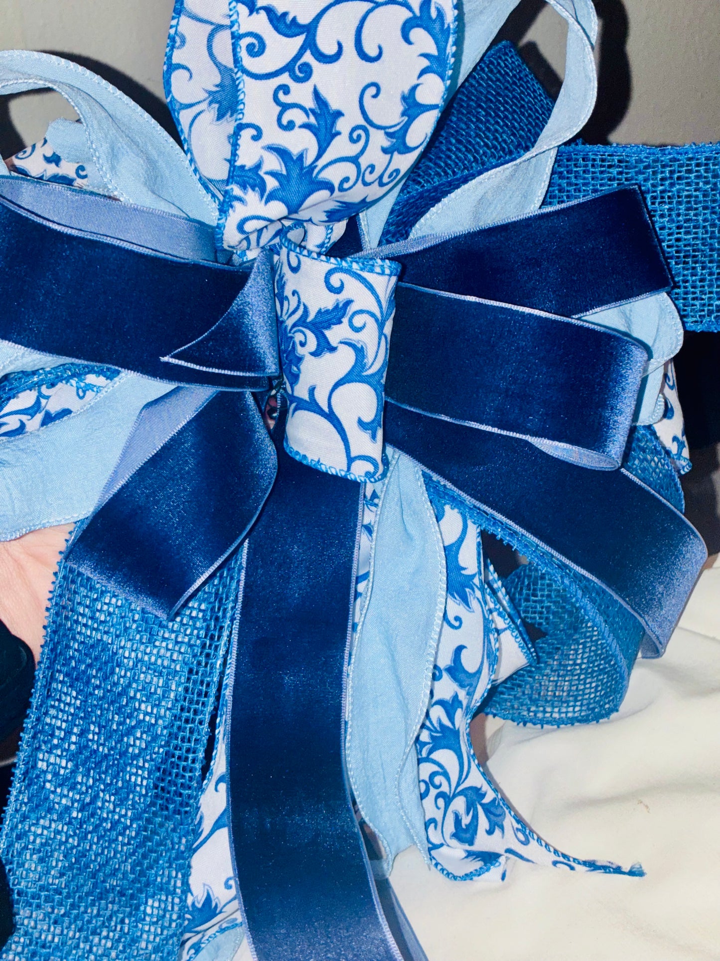 Large blue satin bow