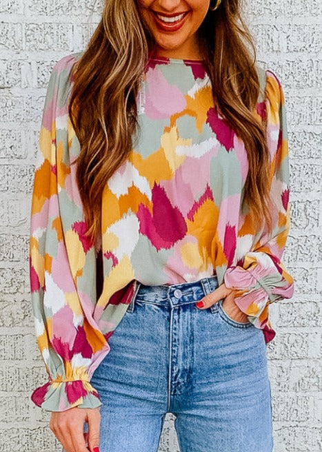 Ray of color top